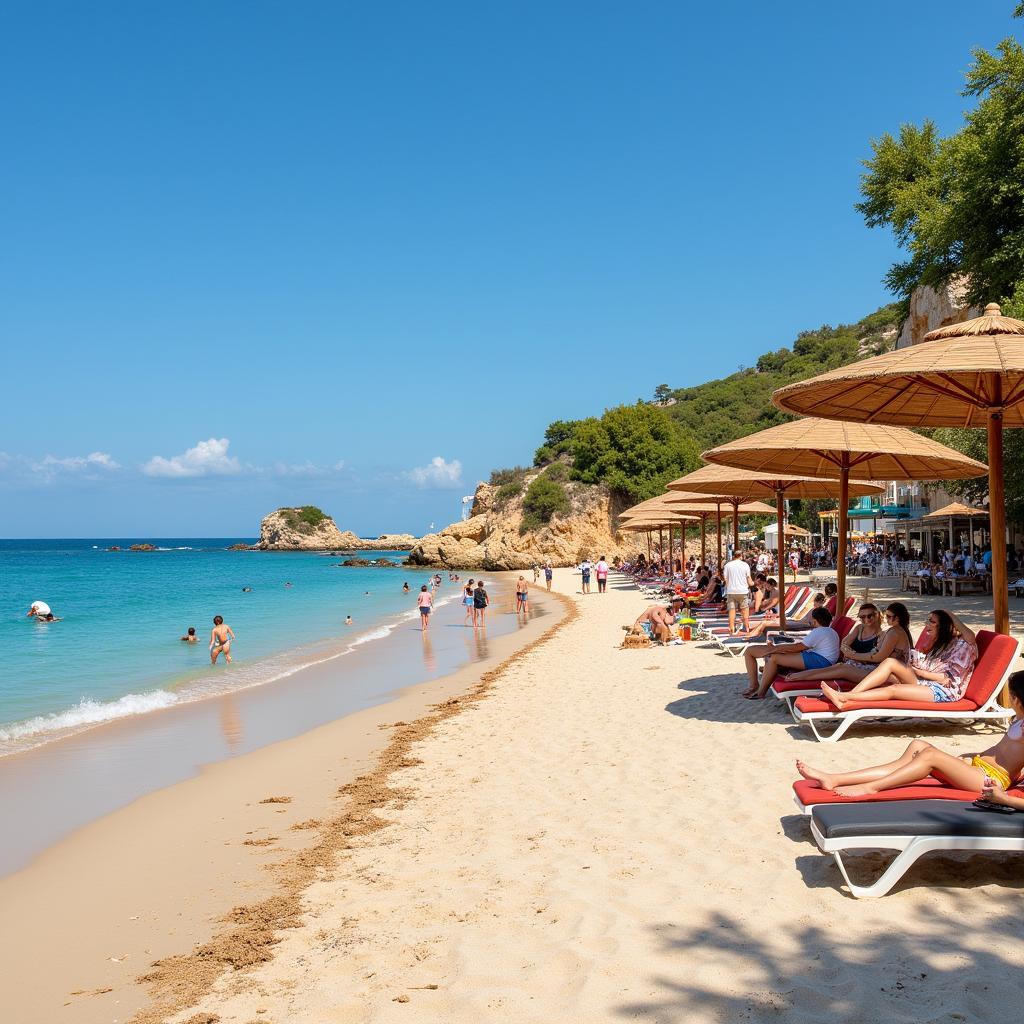 Tourists enjoying various activities on a Cala d'Or beach