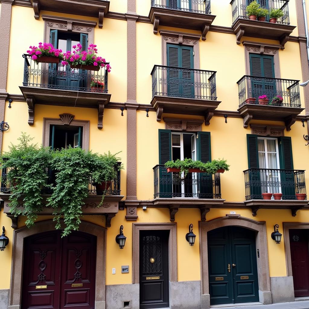 A typical Spanish apartment building adorned with colorful balconies.