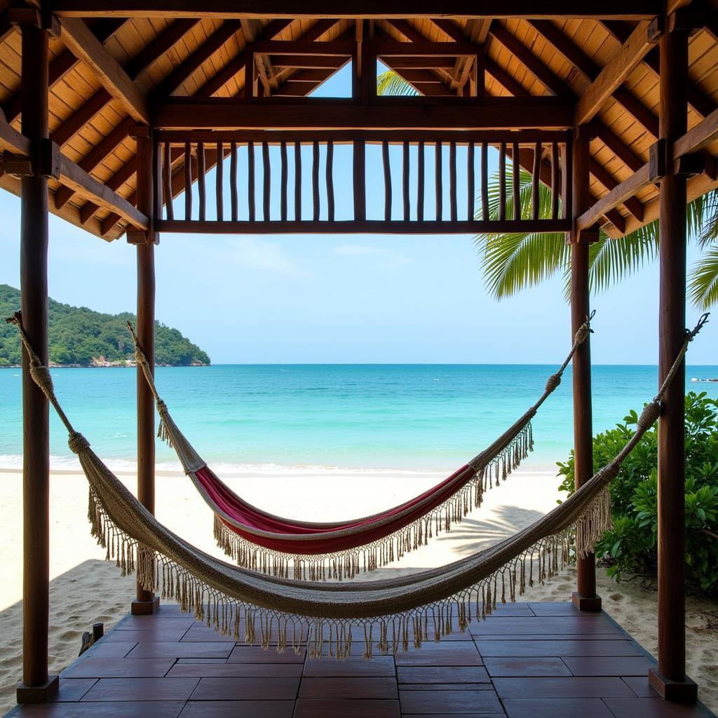 Penarik Beachfront Homestay: Relaxing on a hammock overlooking the turquoise waters of the South China Sea