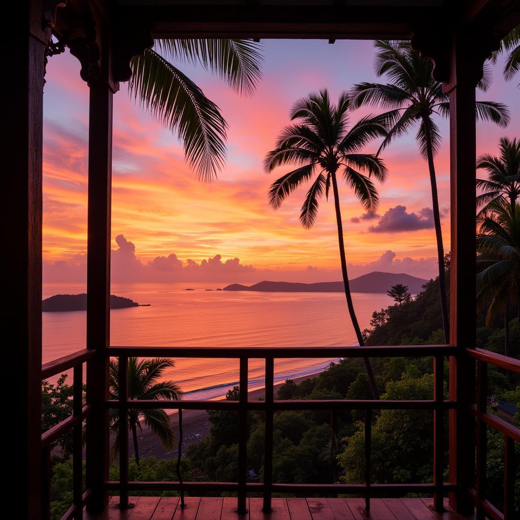 Sunrise over Batu Buruk Beach from a homestay balcony