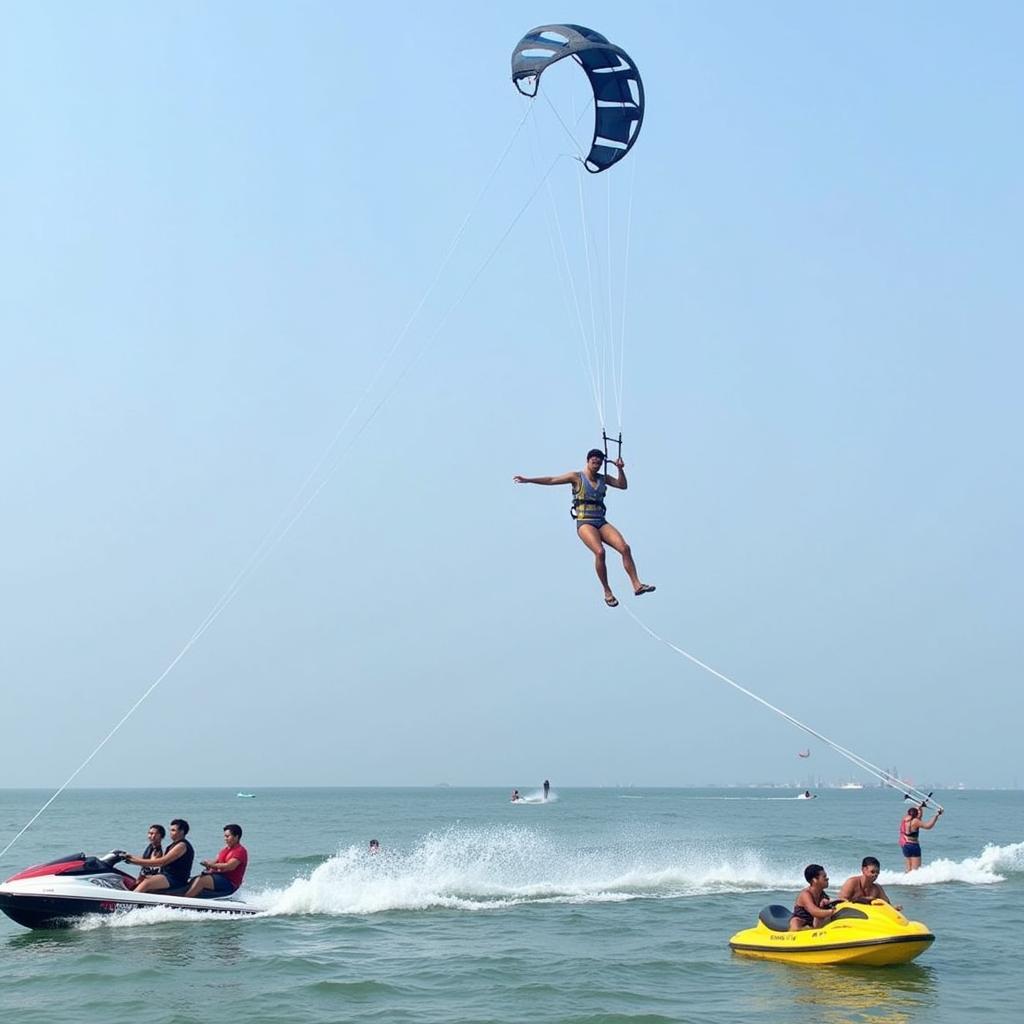 Enjoying watersports at Candolim Beach