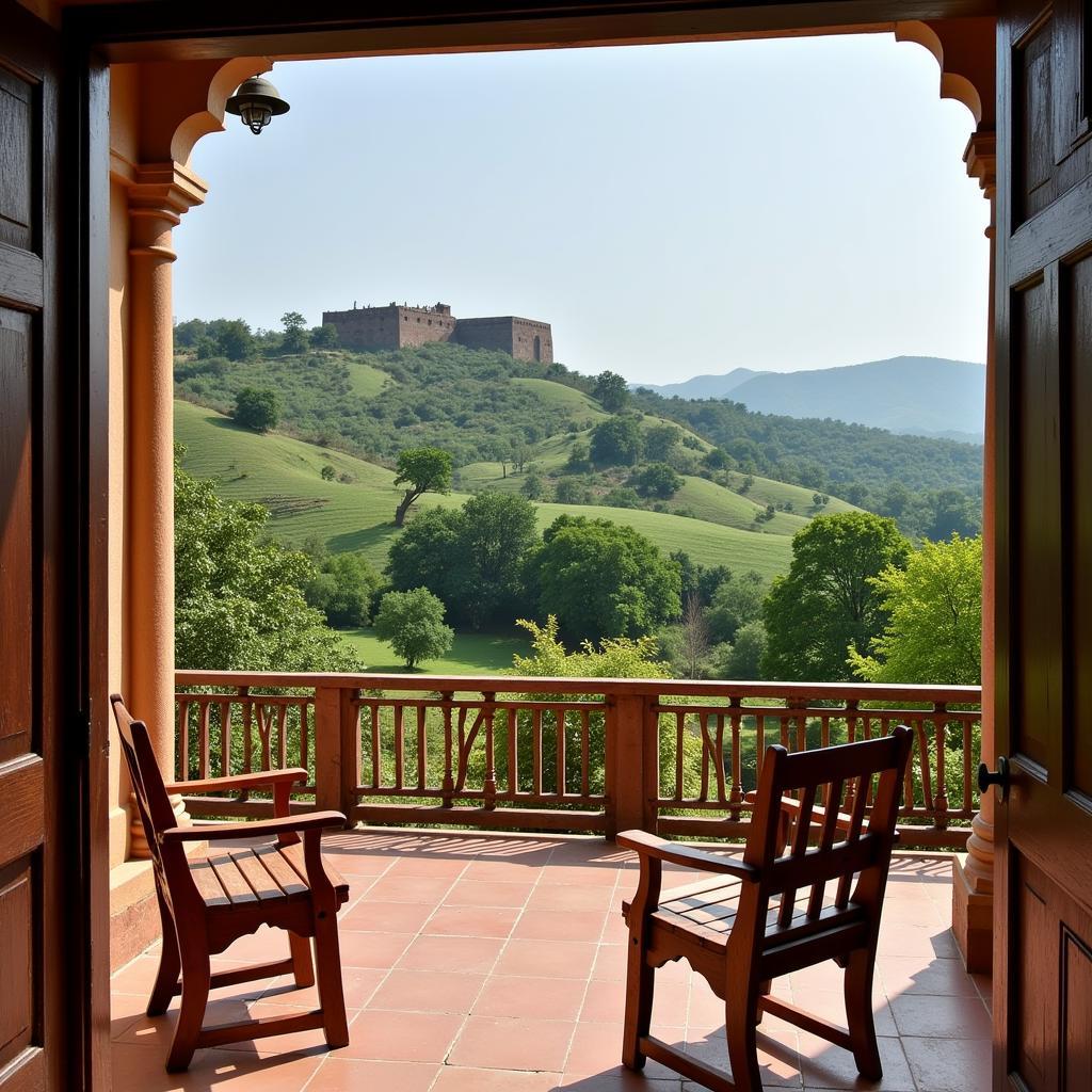 Scenic view of a homestay nestled in the hills near Manjarabad Fort