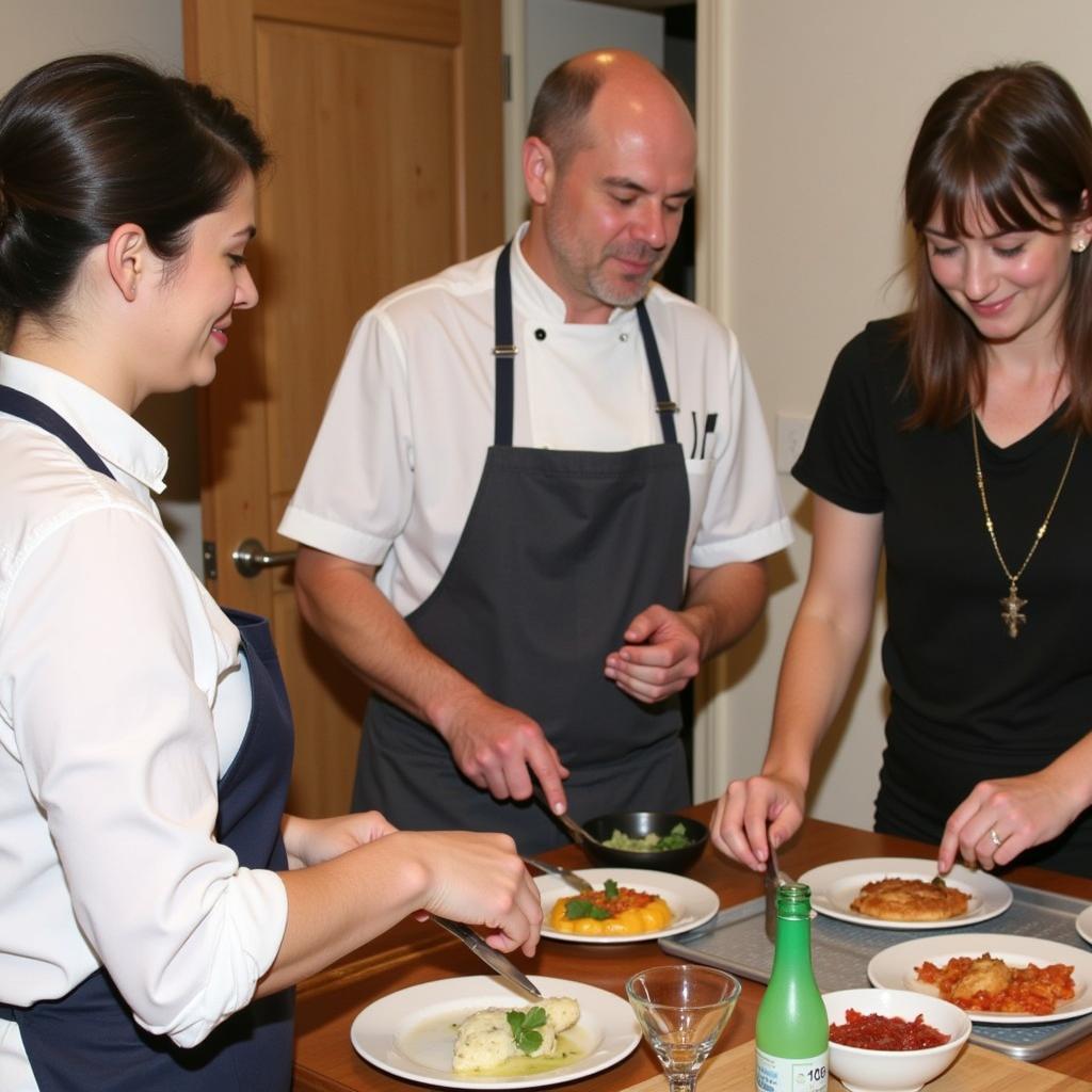 A homestay host teaches a guest how to prepare a traditional Spanish dish in their home kitchen.