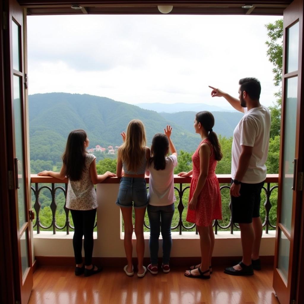 A family enjoying the view from a hilltop homestay in Chikmagalur