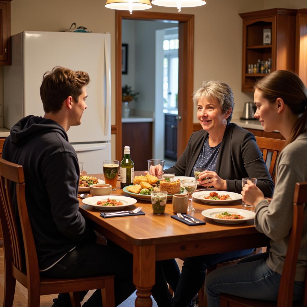 A homestay student enjoying dinner with their host family in West Vancouver.